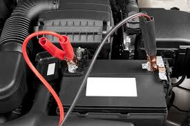 a car battery with cables connected to it